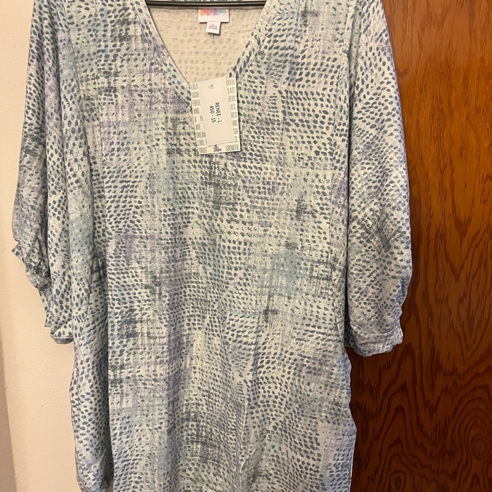 LuLaRoe Renee large Blue 65%polyester 32% Rayon 3% spandex